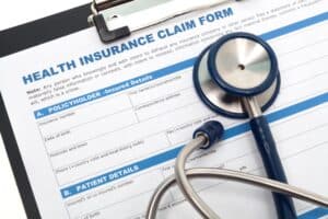 health insurance forms on a clipboard